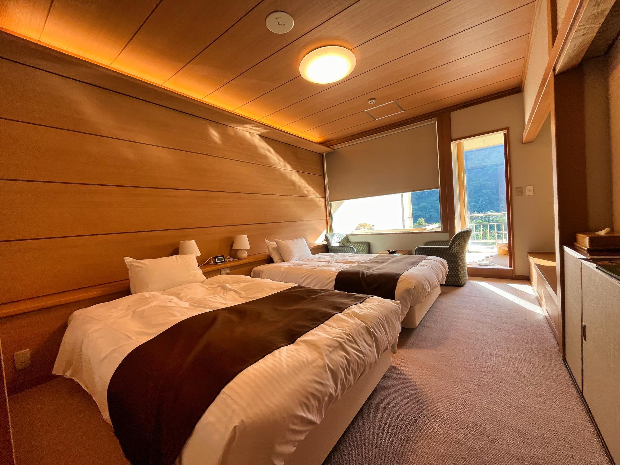 丸峰観光ホテル 客室露天風呂付き 別館 川音 洋室